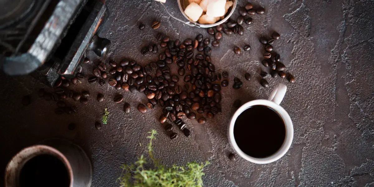 top-view-cup-coffee-with-sugar-cubes